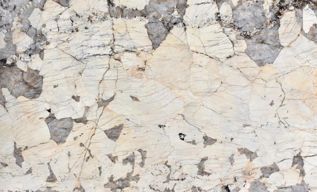 Patagonia Gold Granite slab &mdash; warm honey-gold to amber with flowing mineral patterns